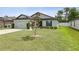 Charming single-story home with well-manicured lawn at 3845 Arborvitae Way, Deland, FL 32724