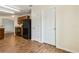 Kitchen featuring wood cabinets, granite countertops, and black appliances at 3845 Arborvitae Way, Deland, FL 32724