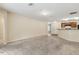 Open concept living room featuring breakfast bar, and spacious floors at 3845 Arborvitae Way, Deland, FL 32724