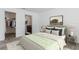 Comfortable main bedroom with ensuite bathroom and walk-in closet for ample storage at 3845 Arborvitae Way, Deland, FL 32724