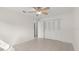 A bright bedroom features tile floors and closet storage at 411 N Halifax Ave # 304, Daytona Beach, FL 32118