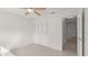 This bedroom features closet storage and tile flooring at 411 N Halifax Ave # 304, Daytona Beach, FL 32118