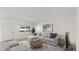 Comfortable living room with lots of natural light and a view to the outside. Tastefully staged for appeal at 411 N Halifax Ave # 304, Daytona Beach, FL 32118