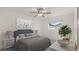Bright main bedroom features modern decor, serene wall art, and an abundance of natural light at 411 N Halifax Ave # 304, Daytona Beach, FL 32118