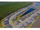 Community aerial view showcasing the neighborhood's layout, waterfront access, and proximity to natural areas at 418 Aquamarine Way, Daytona Beach, FL 32124