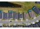 Aerial view of the property highlighting the lot, surrounding homes, and proximity to a pond at 418 Aquamarine Way, Daytona Beach, FL 32124