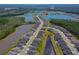 Community aerial view highlighting the neighborhood's layout, lakes, and proximity to the clubhouse at 418 Aquamarine Way, Daytona Beach, FL 32124