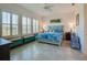 Bright bedroom with ample windows, custom decor and stylish furniture at 418 Aquamarine Way, Daytona Beach, FL 32124