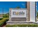 Bayberry Lakes' Florida Tennis Center sign features stacked stone and a bright, welcoming appearance at 418 Aquamarine Way, Daytona Beach, FL 32124