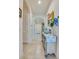Inviting entryway with tile flooring, archways, a decorative console table, and stylish decor, creating a warm welcome at 418 Aquamarine Way, Daytona Beach, FL 32124