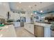 Modern kitchen boasting a center island with barstool seating and stainless steel appliances at 418 Aquamarine Way, Daytona Beach, FL 32124