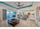 Expansive living room with seamless flow to the kitchen and outdoor living space at 418 Aquamarine Way, Daytona Beach, FL 32124