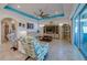 Cozy living room with a stylish ceiling, tile floors, and comfortable seating at 418 Aquamarine Way, Daytona Beach, FL 32124