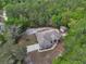Aerial view of home site featuring a large lot surrounded by mature trees providing ample privacy at 4600 S Tomoka Dr, De Leon Springs, FL 32130
