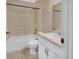 Bright bathroom featuring a shower-tub combo and vanity sink at 4600 S Tomoka Dr, De Leon Springs, FL 32130