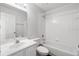 Clean bathroom with a bathtub, shower, toilet, sink and ample lighting at 484 Sherwood Oaks Rd, Orange City, FL 32763
