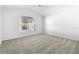 Spacious bedroom featuring neutral carpet and window to provide serene atmosphere at 484 Sherwood Oaks Rd, Orange City, FL 32763