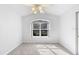 Bright, spacious bedroom with plush carpeting and a sunlit window, providing a serene atmosphere at 484 Sherwood Oaks Rd, Orange City, FL 32763