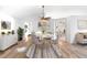 Cozy dining area featuring modern decor, light wood floors and neutral colors at 484 Sherwood Oaks Rd, Orange City, FL 32763