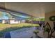 Backyard with a covered patio, grill and a fenced-in backyard at 501 Powers Ave, Port Orange, FL 32127