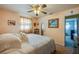 Bedroom with comfortable bed, carpeted floors, and natural light at 501 Powers Ave, Port Orange, FL 32127
