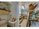 A convenient workshop with a half bath and storage showcases organization and functionality for home projects at 501 Powers Ave, Port Orange, FL 32127