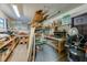 Practical workshop includes ample shelving and storage for lumber, tools, and supplies for any hobbyist at 501 Powers Ave, Port Orange, FL 32127
