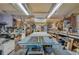 Spacious workshop featuring ample lighting and an array of tools and equipment for various projects at 501 Powers Ave, Port Orange, FL 32127