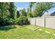 Backyard view featuring a small turf section for sports practice at 5808 Oak Lake Trl, Oviedo, FL 32765