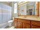 Brightly lit bathroom featuring a boat detail and beachy wall decor at 5808 Oak Lake Trl, Oviedo, FL 32765