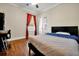 Comfortable bedroom with dark wood floors and ceiling fan at 5808 Oak Lake Trl, Oviedo, FL 32765