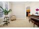 Formal sitting area featuring an orchid and a chair with decorative pillow at 5808 Oak Lake Trl, Oviedo, FL 32765
