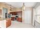 Bright, open kitchen with stainless steel appliances and a kitchen island at 6794 Calistoga Cir, Port Orange, FL 32128