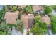 Aerial view outlining property lines of townhomes featuring mature landscaping and community parking at 7 Appaloosa Trl, Ormond Beach, FL 32174