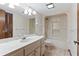 Neutral bathroom featuring a shower-tub combo and classic vanity at 7 Appaloosa Trl, Ormond Beach, FL 32174