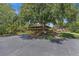 Community clubhouse nestled beneath a majestic oak tree at 7 Appaloosa Trl, Ormond Beach, FL 32174