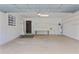 Spacious two car garage with built-in storage shelves and plenty of open space at 7 Appaloosa Trl, Ormond Beach, FL 32174