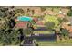 Aerial view showcasing a sparkling community pool with ample parking at 7 Appaloosa Trl, Ormond Beach, FL 32174