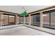 Sunroom with lots of windows and a view of the backyard and neighborhood at 7 Appaloosa Trl, Ormond Beach, FL 32174