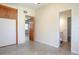 Comfortable bedroom with connecting bathroom and view of living area at 782 Valencia Ave, Orange City, FL 32763