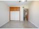 Bedroom featuring a built-in closet, ceiling fan, and neutral color scheme at 782 Valencia Ave, Orange City, FL 32763