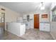 Well-lit kitchen featuring modern appliances, ample countertop space, and a neutral color palette at 782 Valencia Ave, Orange City, FL 32763