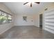 Bright living room featuring a ceiling fan, neutral walls, and windows with natural light at 782 Valencia Ave, Orange City, FL 32763