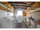 The utility room offers a washer, dryer, utility sink, storage shelves, and work space at 782 Valencia Ave, Orange City, FL 32763