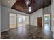 A living room featuring dark plank ceiling and a mirrored closet at 816 Overhill Rd, Deland, FL 32720