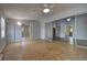 Bright living room with an open floor plan and sliding glass doors at 816 Overhill Rd, Deland, FL 32720