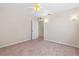 Bright bedroom with carpet, ceiling fan, and accent lighting at 863 Riverside Dr, Ormond Beach, FL 32176