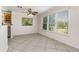 Dining area with large windows, lots of natural light and connecting breakfast bar at 863 Riverside Dr, Ormond Beach, FL 32176