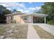Attractive single-Gathering home with a covered carport, offering convenient parking at 954 Chippendale St, Deltona, FL 32725