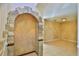 Unique archway feature and tile flooring create an inviting and interesting entryway at 1 Fox Hollow Dr, Ormond Beach, FL 32174
